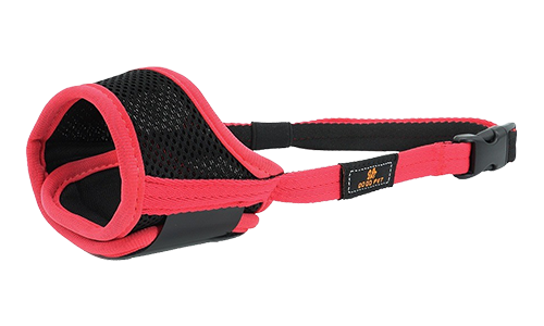 Soft padded adjustable dog muzzle in pink, lightweight nylon material, designed for comfort and secure fit.