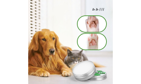 Organic Paw Balm for Dogs and Cats Green and white tin and box of organic, all-natural paw balm for dogs and cats, 60g, gentle and effective.