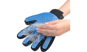 Blue grooming glove with dog hair accumulated, demonstrating its deshedding functionality, easy to wash material.